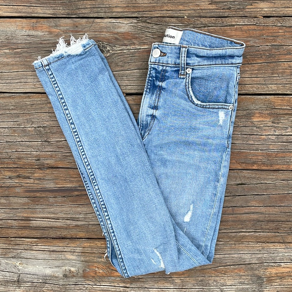 Reformation Light Wash High-Rise Distressed Skinny Jeans